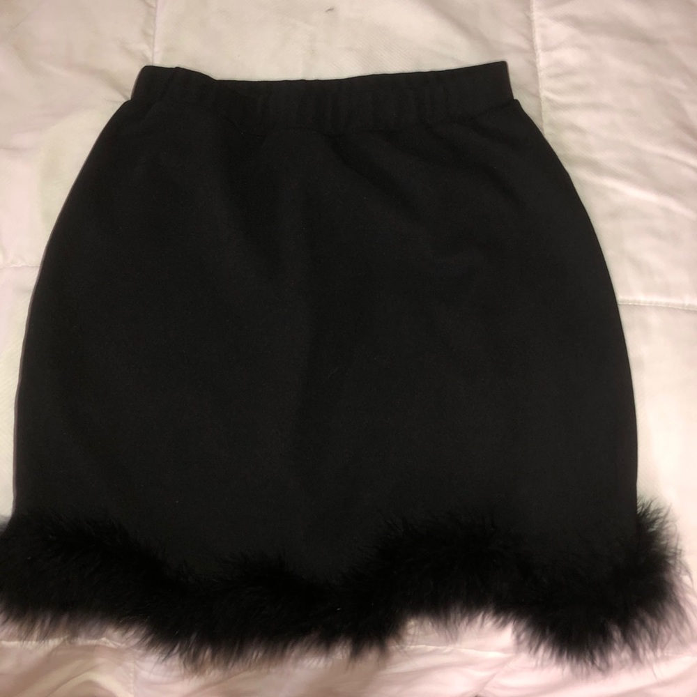 Black mini skirt with feather detail
